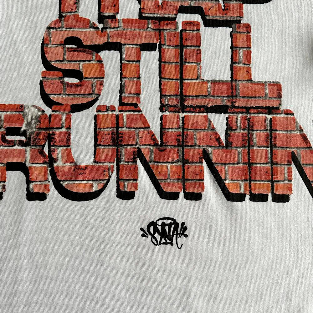 SYAN TRAP STILL RUNNIN TEE