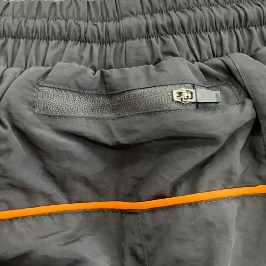 SYNA SHELL TRACKSUIT (BLACK/ORANGE)