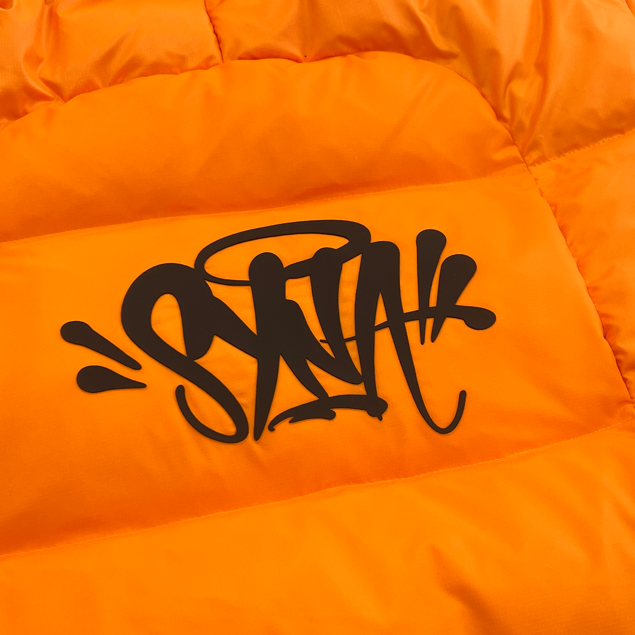 SYNA WORLD WAVE PUFFER JACKET (ORANGE)