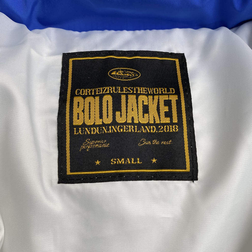 CORTEIZ AVALANCHE BOLO DOWN JACKET (BLUE)