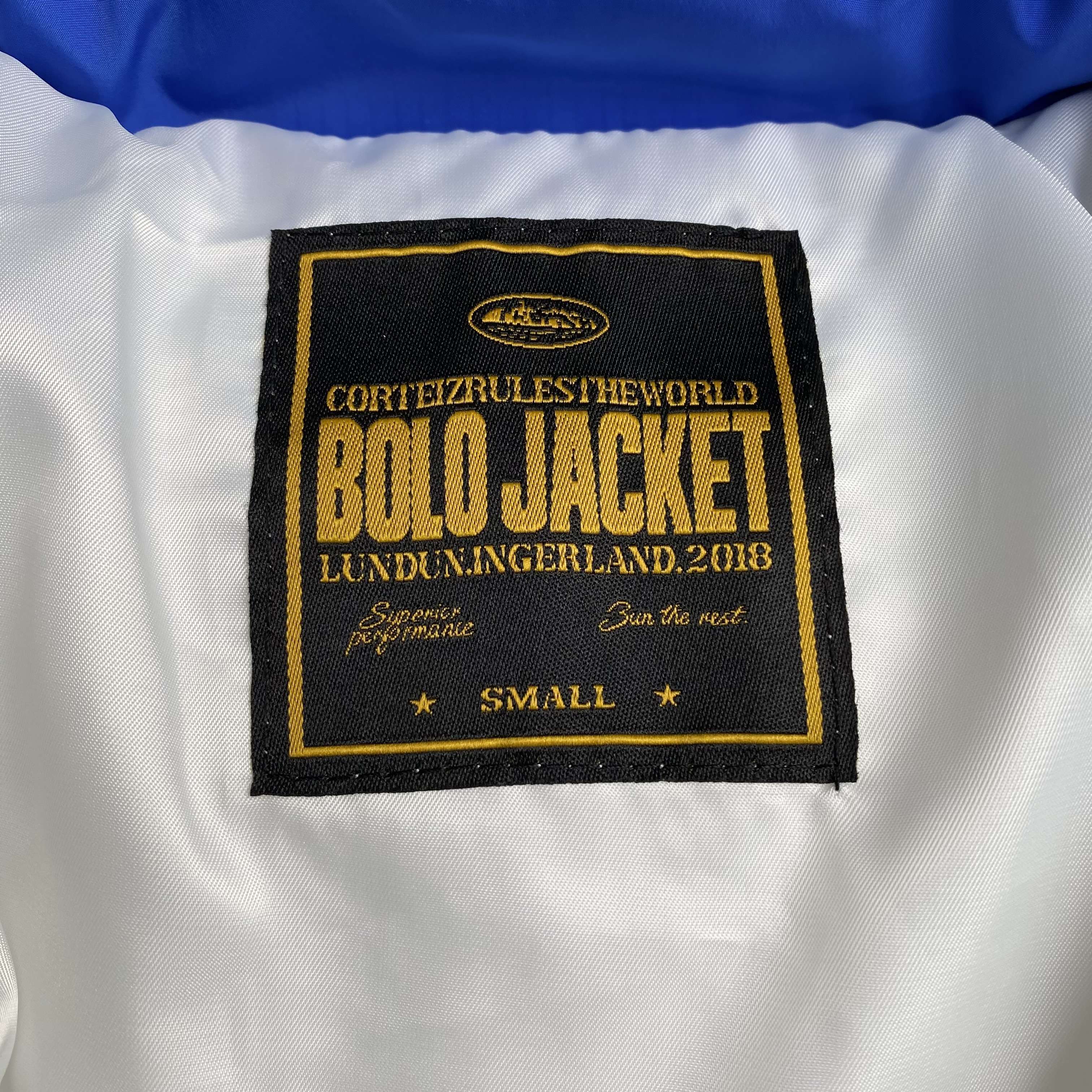 CORTEIZ AVALANCHE BOLO DOWN JACKET (BLUE)