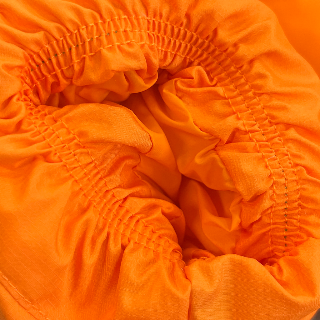 SYNA WORLD WAVE PUFFER JACKET (ORANGE)