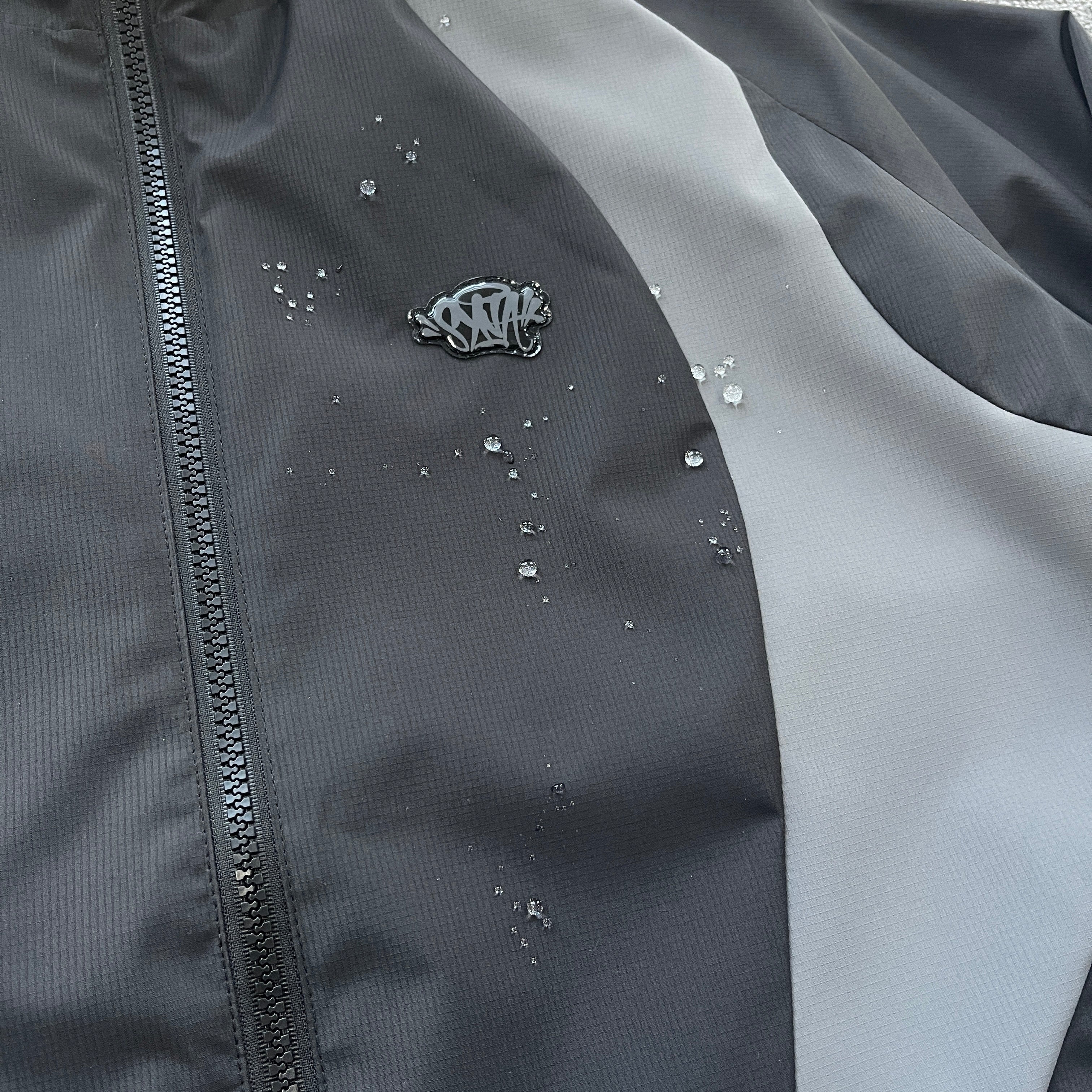 SYNA VORTEX WOVEN JACKET (BLACKOUT)