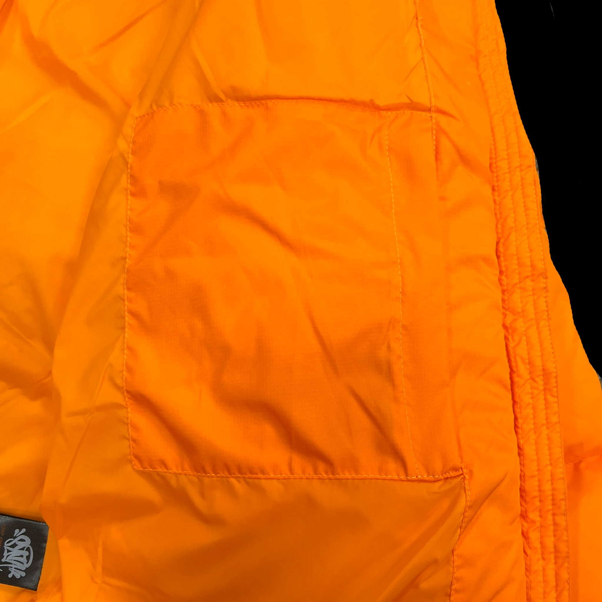 SYNA WORLD WAVE PUFFER JACKET (ORANGE)